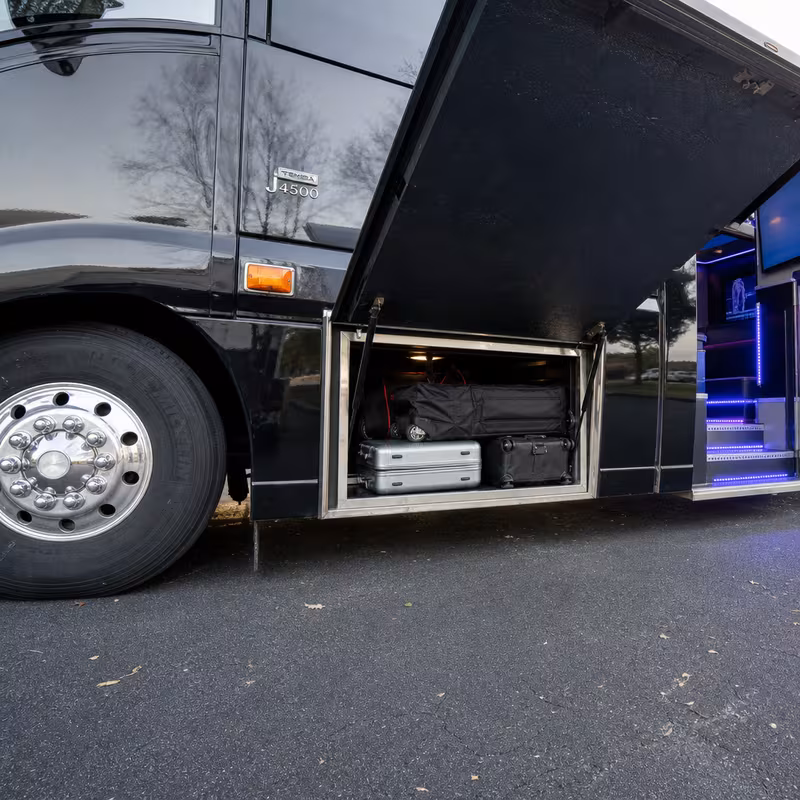 Party bus interior with wraparound leather seating and LED lighting in Myrtle Beach