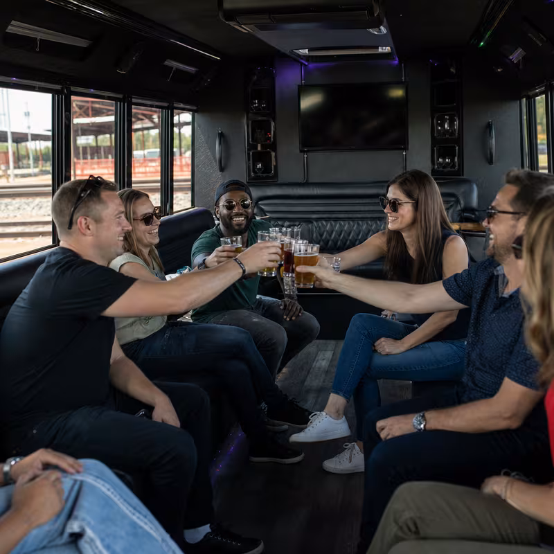 Group boarding a white charter bus for Winery & Brewery Tour Transportation transportation in Myrtle Beach