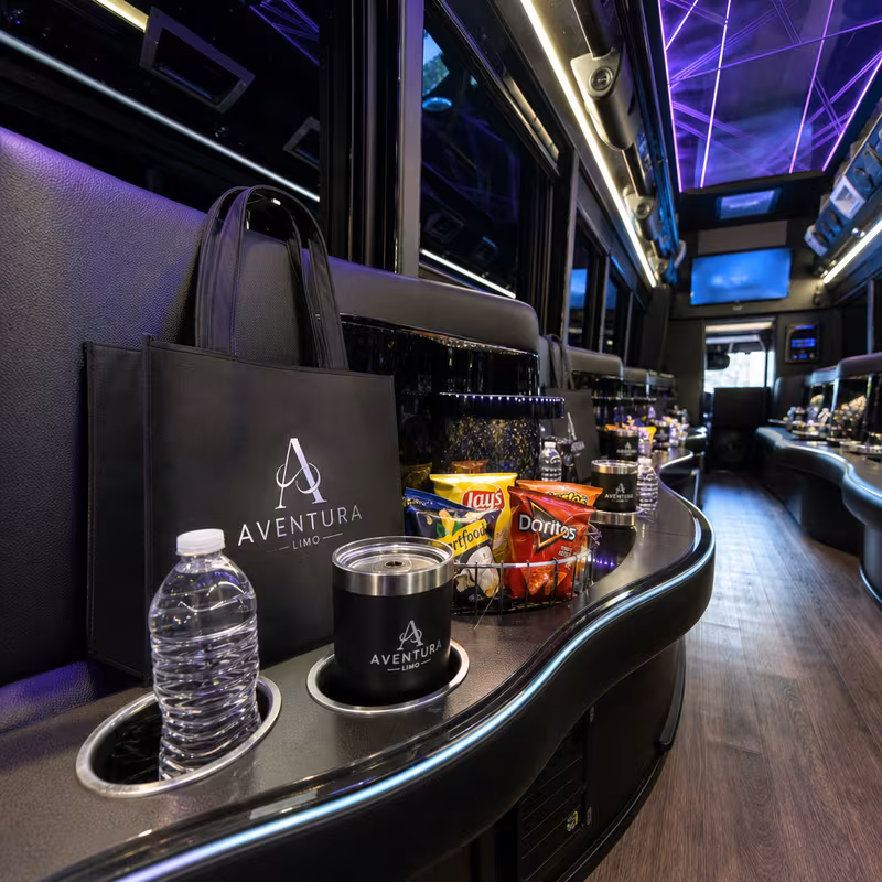 Party bus interior with wraparound leather seating and LED lighting in Myrtle Beach